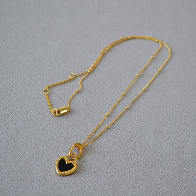 Collana con Ciondolo a Cuore in Bianco e Nero in Oro