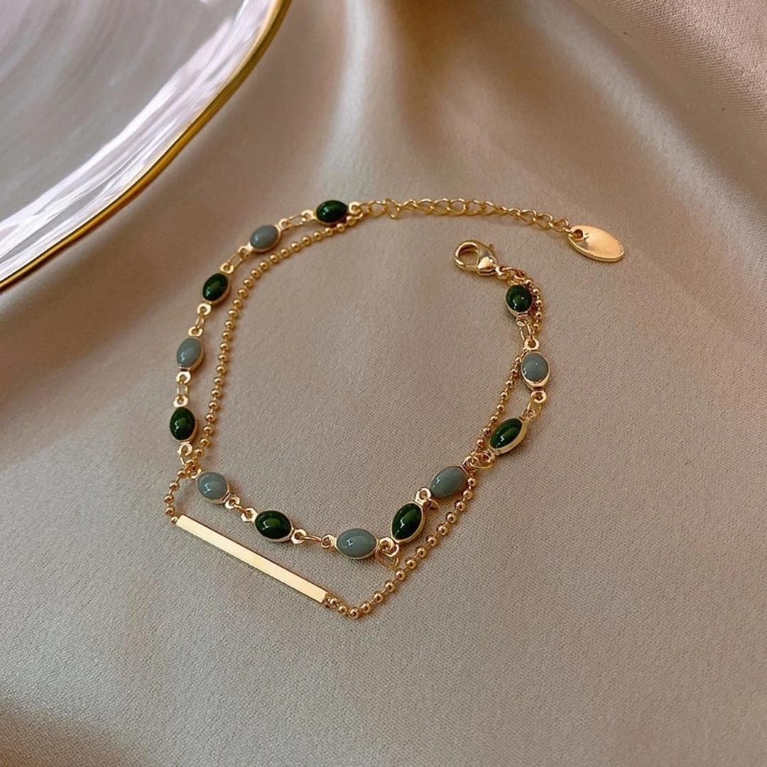 Bracciale con Pietre Verdi in Oro