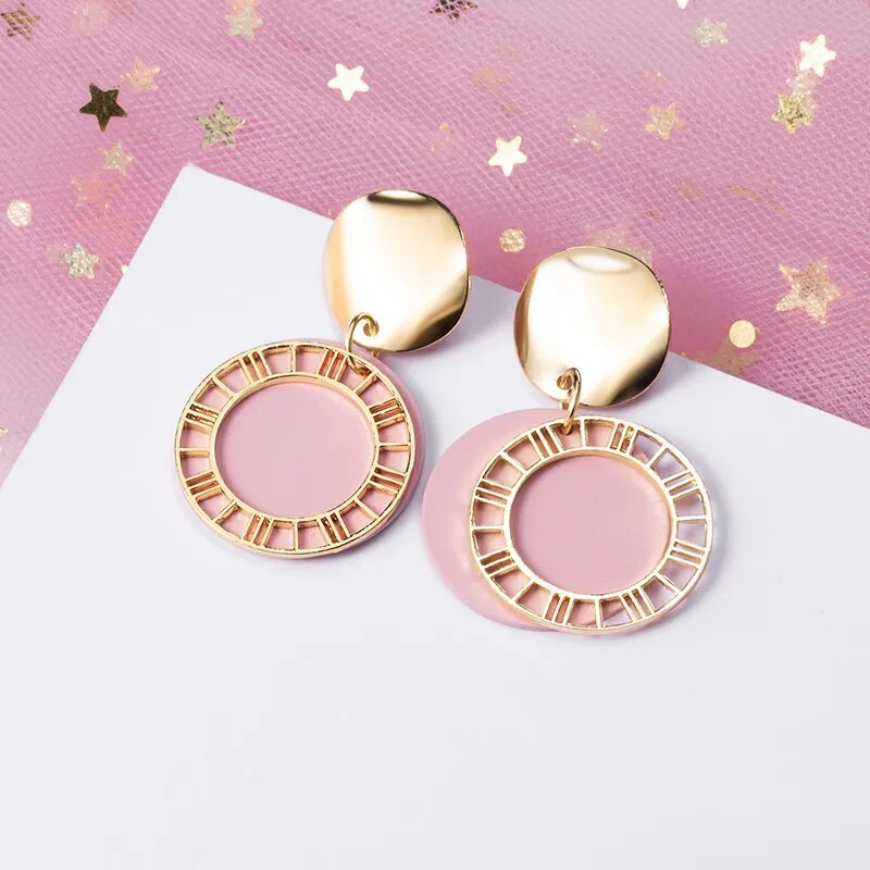 Eleganti orecchini d'oro e rosa